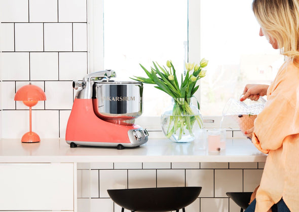 The beautiful Coral Crush Ankarsrum brightens any kitchen.  Why not love your mixer? With Ankarsrum, it's easy to.